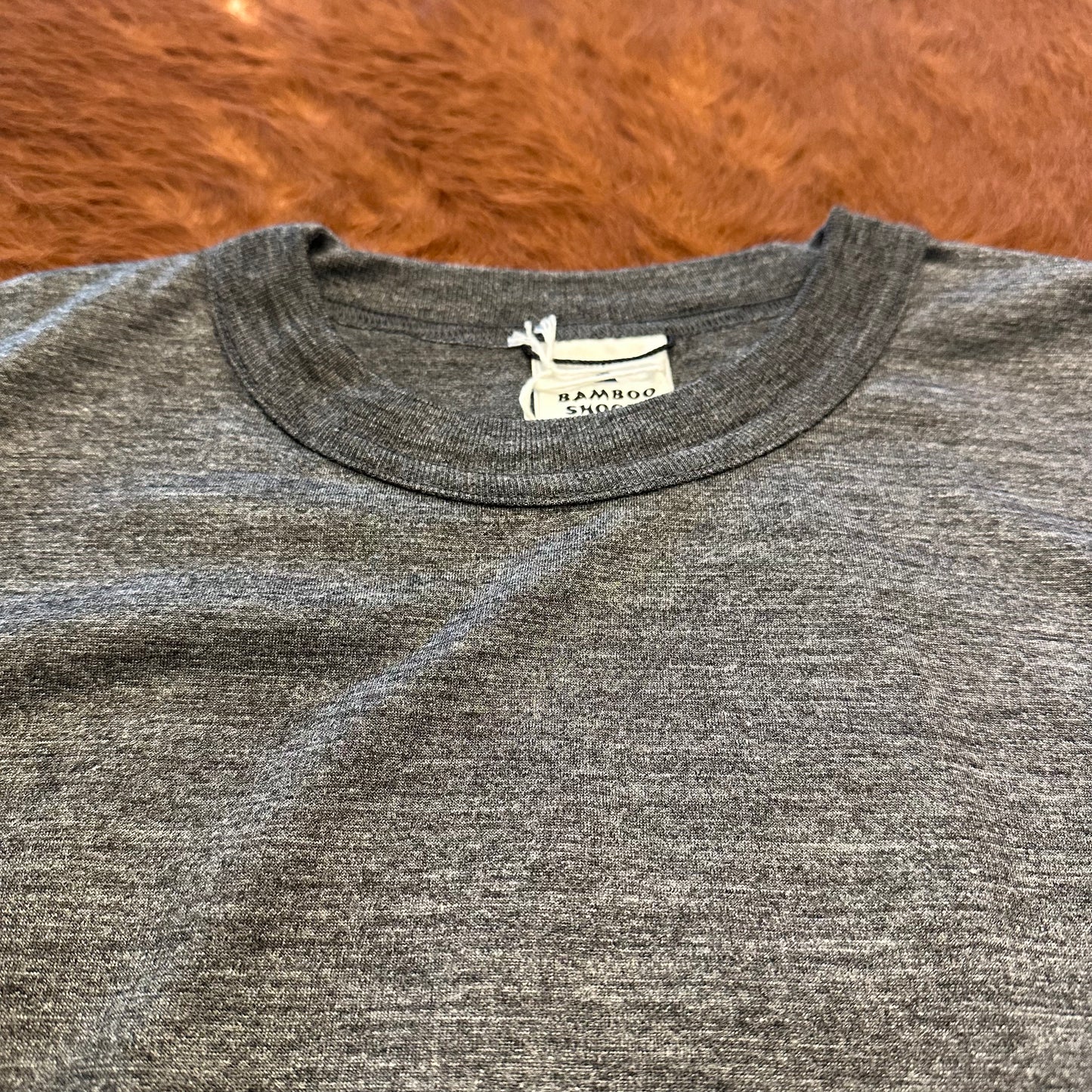 "MERINO WOOL SLEEVELESS TEE"