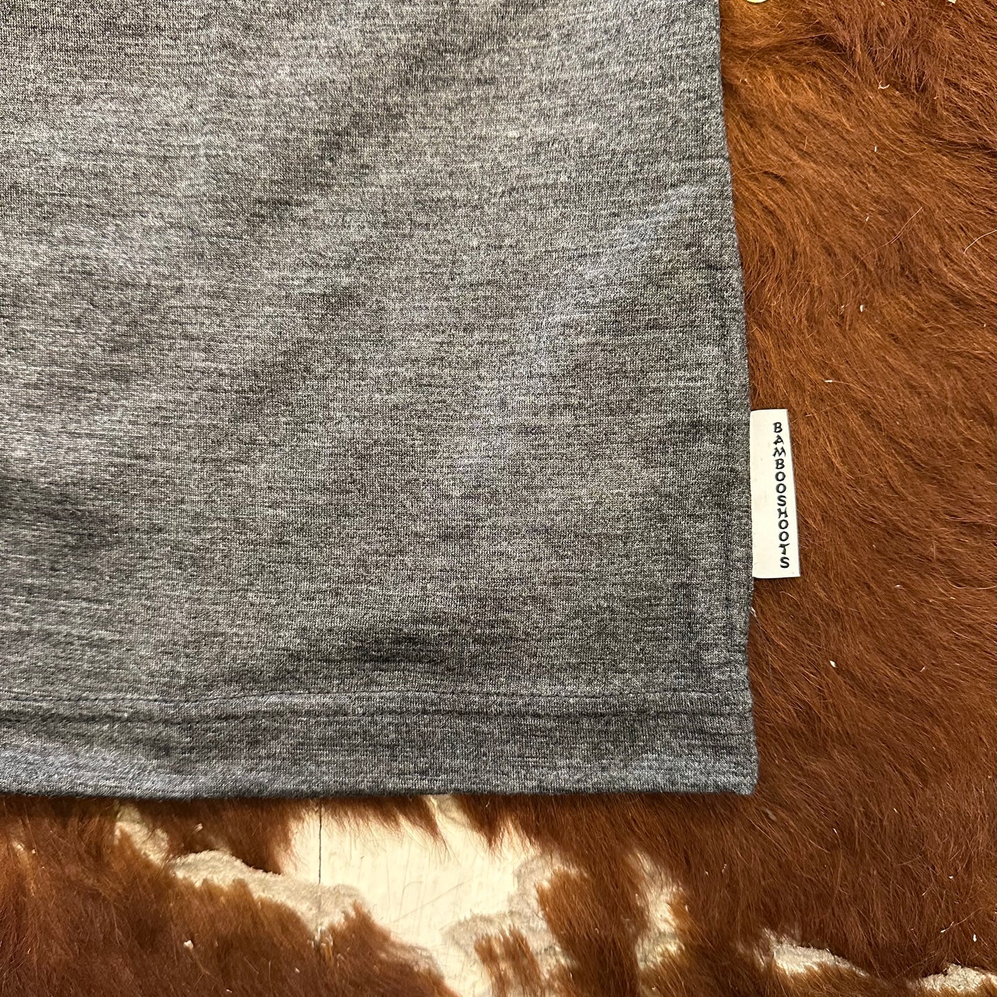 "MERINO WOOL SLEEVELESS TEE"