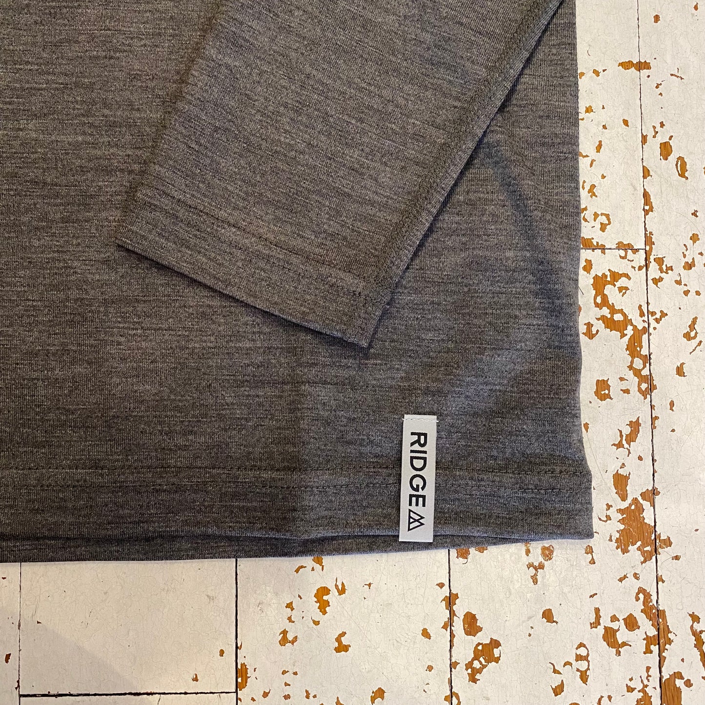 "MERINO HALF ZIP STAND COLLAR"