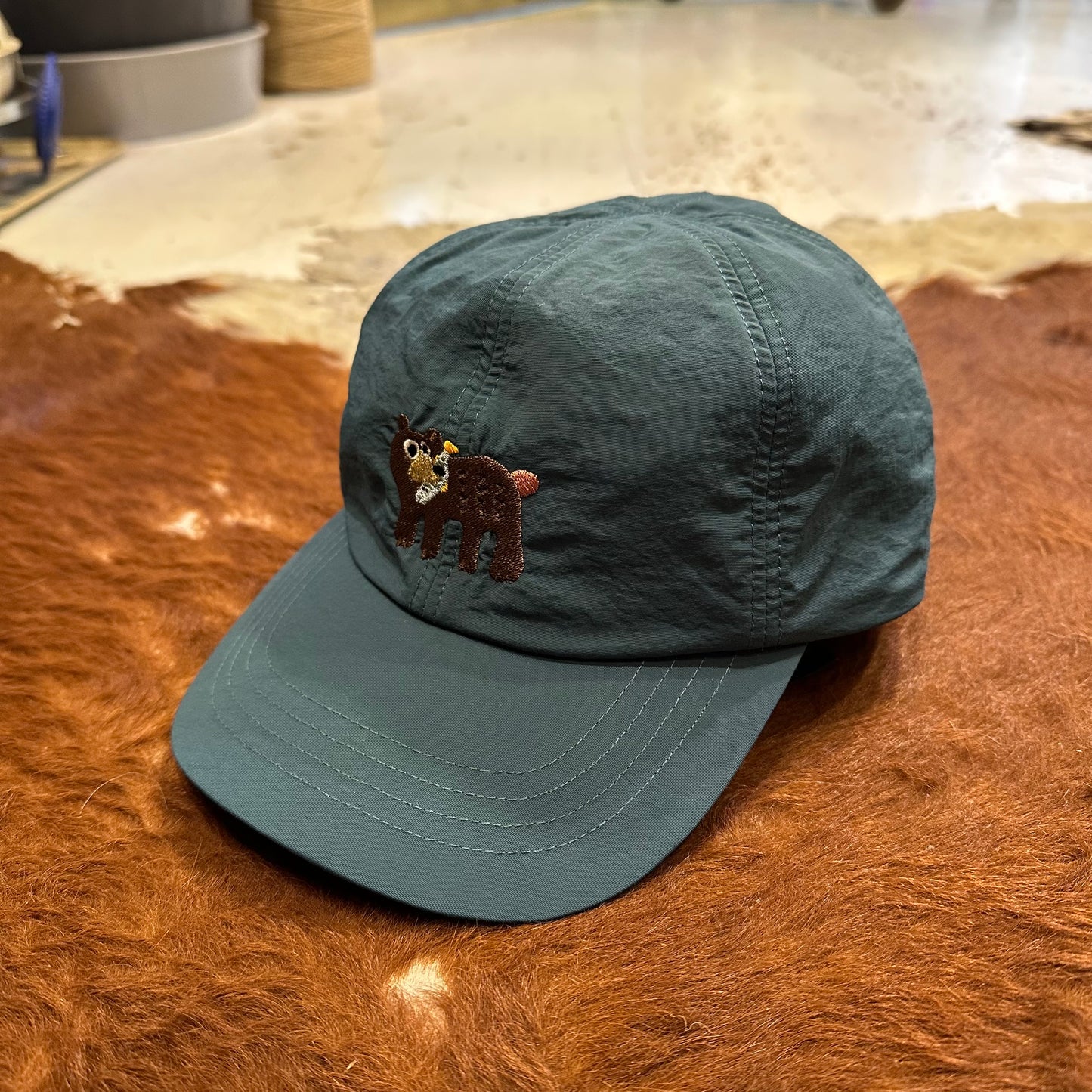 "KUMA CAP"