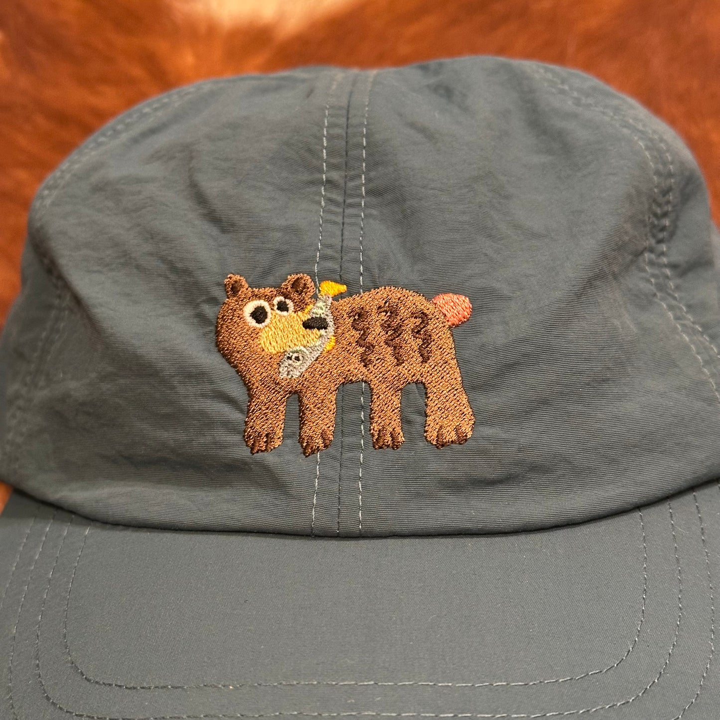 "KUMA CAP"