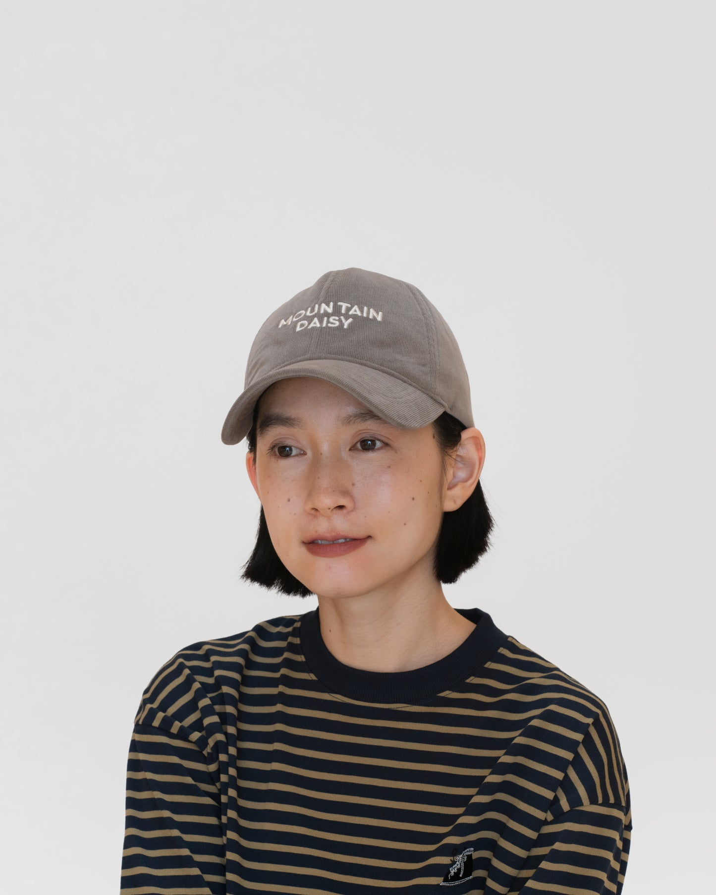 "MOUNTAIN DAISY CORDUROY CAP"