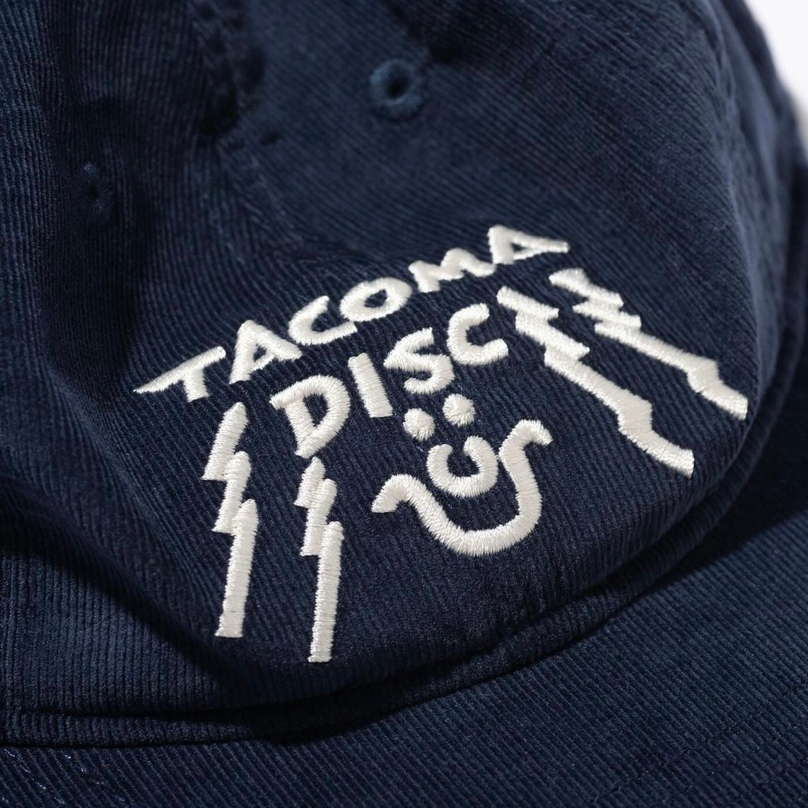 "TACOMA DISC CAP designed / by Tomoo Gokita"