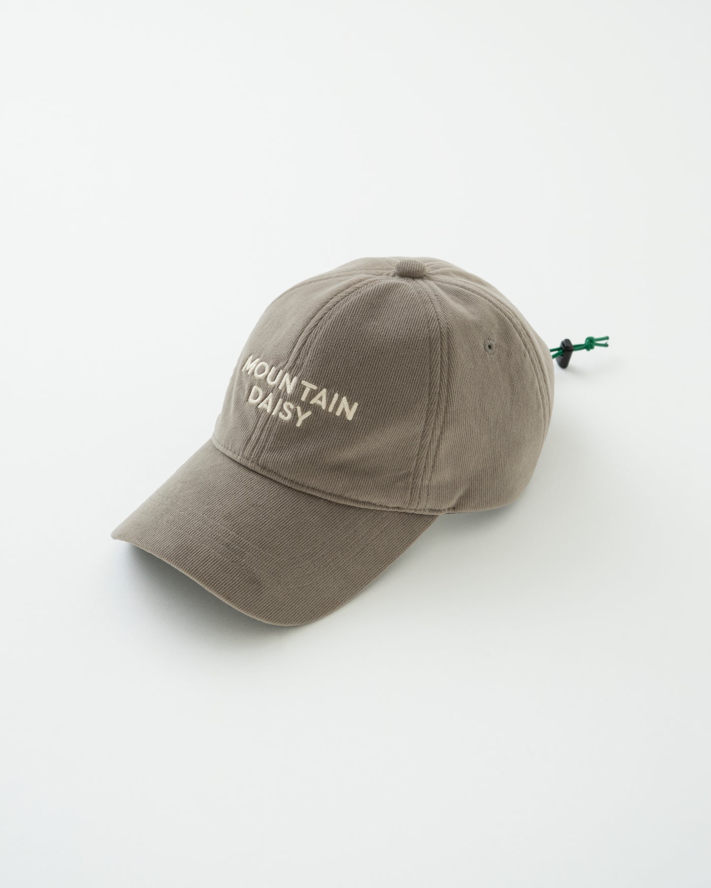 "MOUNTAIN DAISY CORDUROY CAP"