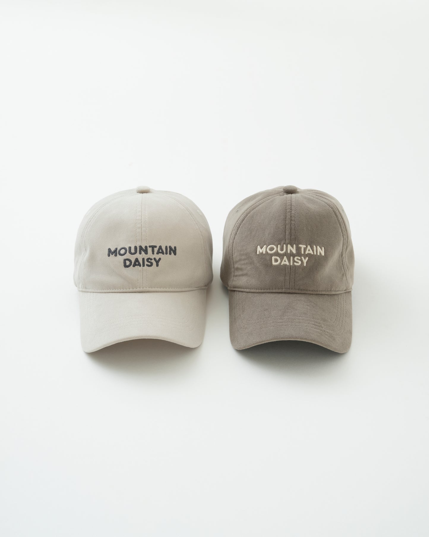 "MOUNTAIN DAISY CORDUROY CAP"