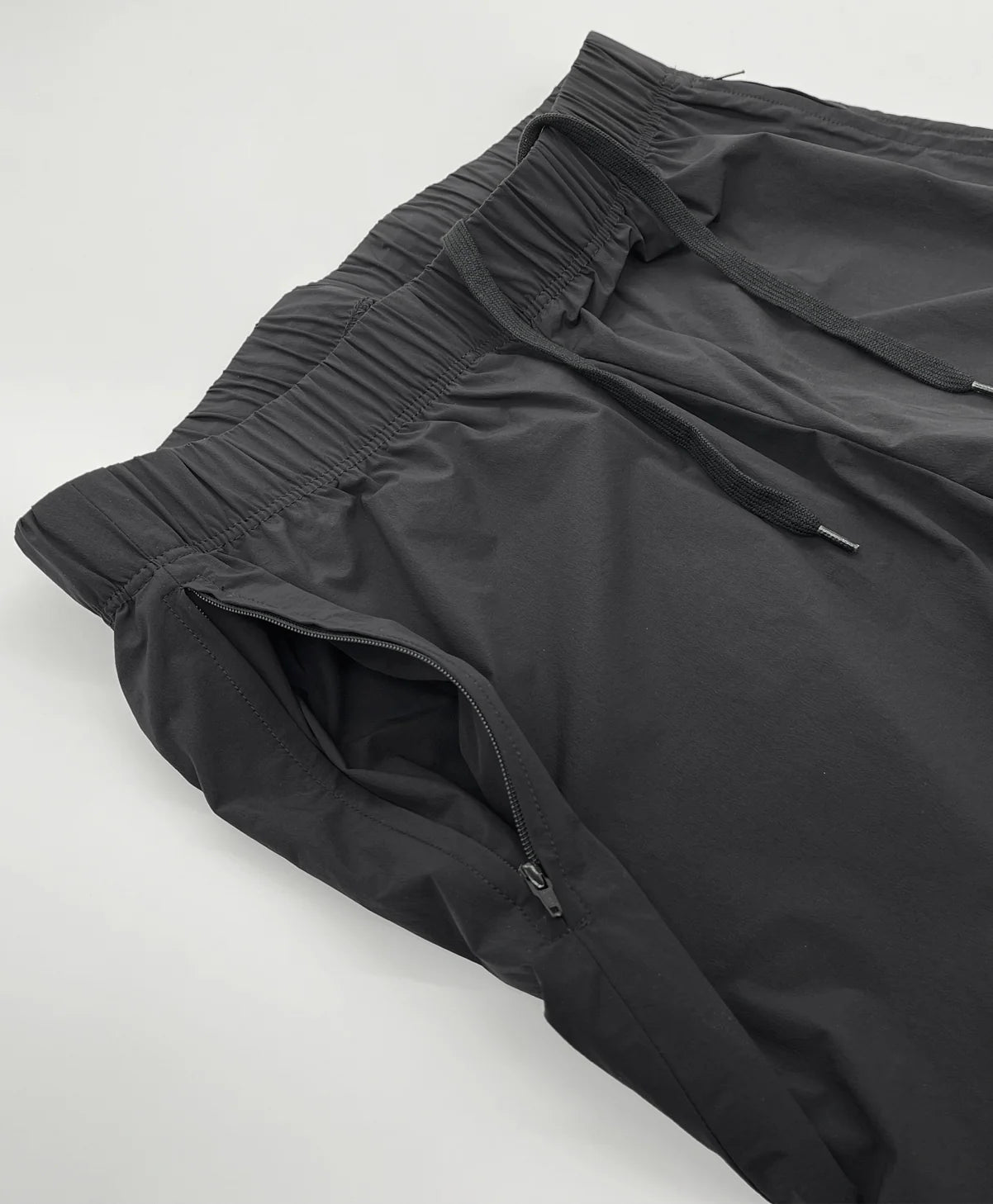 "STRETCH WINDSHELL PANTS"